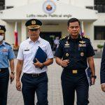Newsroom desk with lottery results analysis